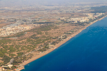 Aerial view of Antalya city and the Mediterranean sea in Turkey. View from a plane