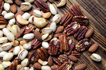 Close-ups of nuts of different varieties and types, a healthy snack.