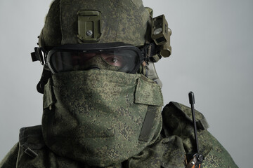 Male in russian infantry protect uniform. Isolated on grey background.