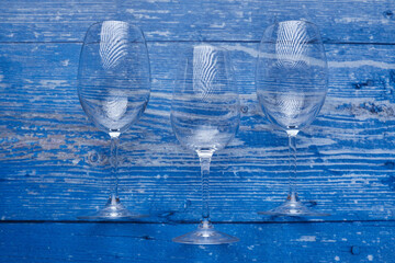 three wine glasses on the table - 422637033