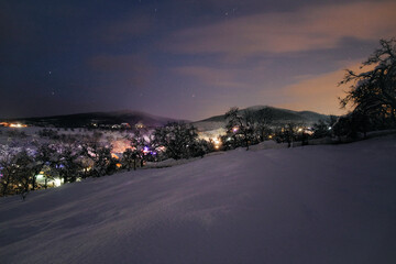 winter in a mountain village, night lights