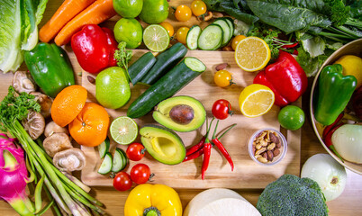 Healthy food clean eating selection: fruit, vegetable, seeds, superfood, leaf vegetable and mediterranean dishes. Detox and clean diet. Foods high in vitamins, minerals and antioxidants.