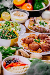 Healthy food clean eating selection: fruit, vegetable, seeds, superfood, leaf vegetable and mediterranean dishes. Detox and clean diet. Foods high in vitamins, minerals and antioxidants.