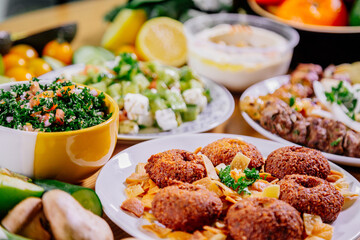 Healthy food clean eating selection: fruit, vegetable, seeds, superfood, leaf vegetable and mediterranean dishes. Detox and clean diet. Foods high in vitamins, minerals and antioxidants.