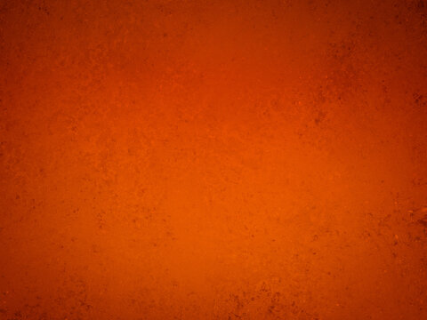Warm orange background with old grunge texture in abstract vintage design