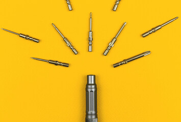 Mechanical bit set tool concept on a yellow background