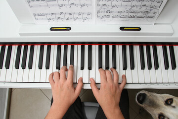 Fototapeta na wymiar hands playing piano, Electric piano top view