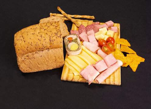 Table of cold cuts and snacks
