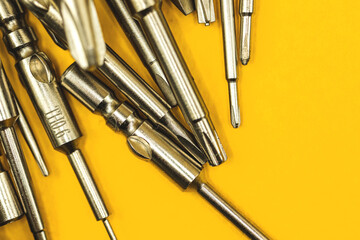 Various replaceable metal bits for mechanical screwdriver, repair equipment