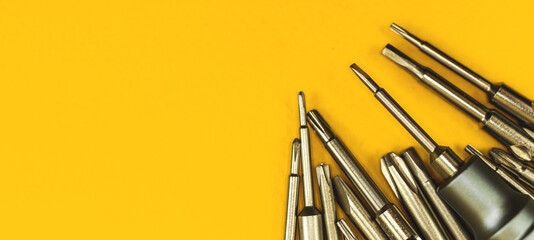 Repair equipment background, screwdriver tool with metal bits background banner, top view and copy...