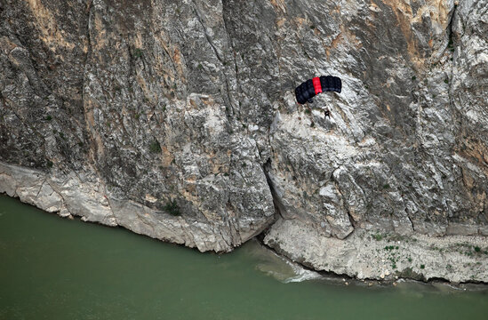Base Jump after paragliding on the Dark Canyon in district of Kemaliye (Egin), Erzincan, Turkey. Kemaliye is extreme sport center in Eastern Turkey.