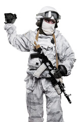 Fototapeta premium Male in soldier (snow camouflage) uniform with weapon. Shot in studio. Isolated with clipping path on white background