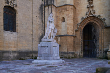 Fototapeta na wymiar Statue of Alfonso II el Casto next to the cathedral of Oviedo (Uviéu)