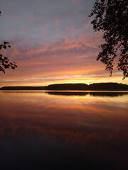 Obraz na płótnie Canvas sunset over lake