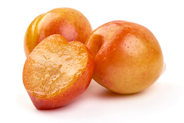 Sweet yellow plums, isolated on white background