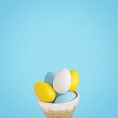 Painted blue, yellow and white eggs in an ice cream cone pot. Easter concept blue background with copy space.