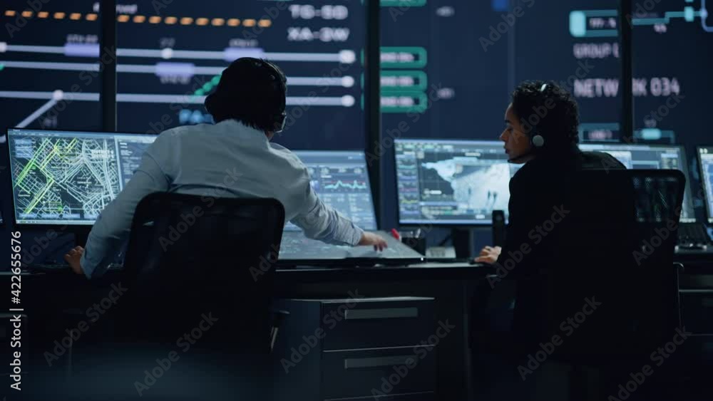 Poster Professional IT Technical Support Specialists and Software Programmer Working on Computers in Monitoring Control Room with Digital Screens with Server Data, Blockchain Network and Surveillance Maps. 