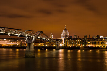 Fototapeta na wymiar Millennium bridge and St Paul's Cathedral at night, London, UK