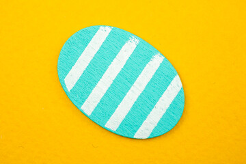 Colorful painted easter egg close-up, flat lay