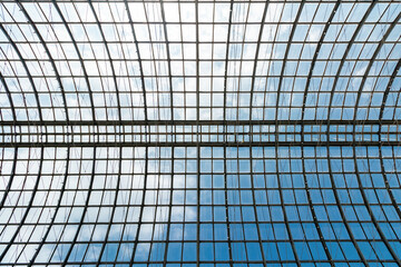 Fototapeta premium Transparent roof of the building made of glass and metal. Background.
