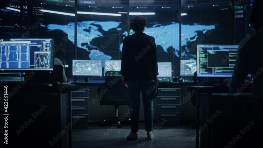 Aufkleber Diverse Multiethnic Female IT Technical Support Manager with Short Hair Comes to Her Workplace in Monitoring Control Room Office with Big Digital Screens with Server Technical Blockchain Data.