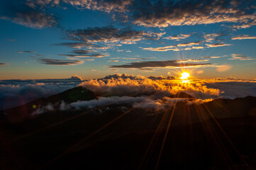 Fototapeta na wymiar Early Morning Sunrise on top of the Volcano at Haleakala National Park, Maui, Hawaii, United States