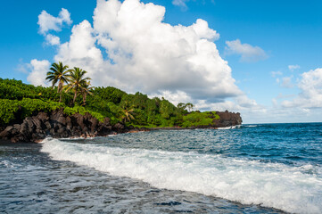 Black Sand Beach and Tropical Coastline along the Road to Hana, Maui, Hawaii