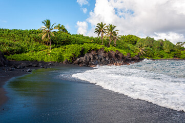 Black Sand Beach and Tropical Coastline along the Road to Hana, Maui, Hawaii