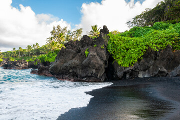Black Sand Beach and Tropical Coastline along the Road to Hana, Maui, Hawaii