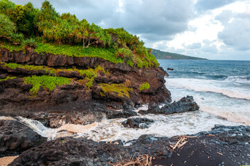 Black Sand Beach and Tropical Coastline along the Road to Hana, Maui, Hawaii
