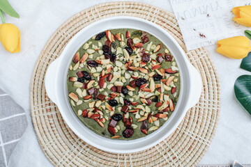 Healthy green tea brownie with almonds On Wooden Table With Copy Space. Delicious homemade.