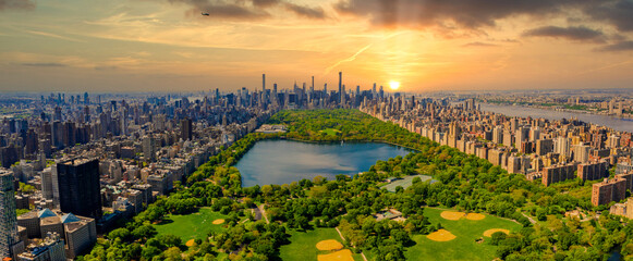 Central Park aerial view, Manhattan, New York. Park is surrounded by skyscraper.