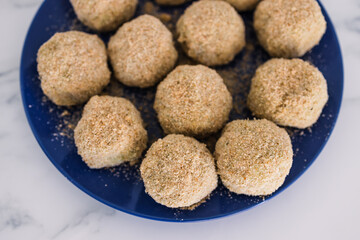 vegan arancini risotto balls about to get fried, healthy plant-based food