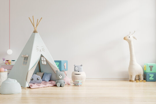 Children's playroom with tent and table sitting white wall,doll.