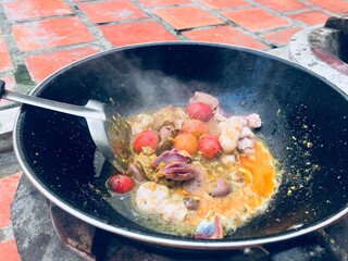 frying pan with chicken