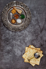 Jewish matzah, kiddush and seder with egg, bone, herbs, walnut. Passover concept.