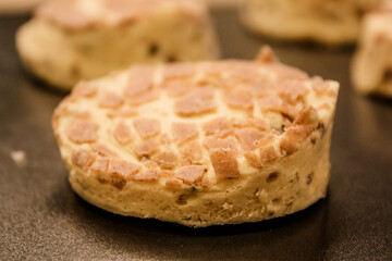 Delicious uncooked cinnamon roll on a pan waiting to be cooked