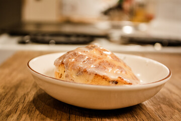 Delicious hot cinnamon roll with icing