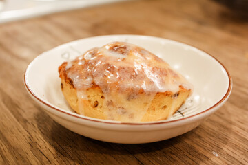 Delicious hot cinnamon roll with icing