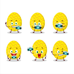 Photographer profession emoticon with yellow easter egg cartoon character