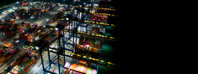 Aerial top view of Containers cargo ship at night. Business logistic transportation sea freight,...