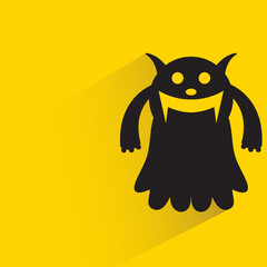 cute monster with shadow on yellow background