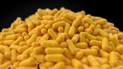 Heap of trendy yellow pills close up isolated on black