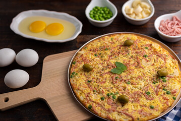 Omelete de ovos com ervilha, palmito e presunto