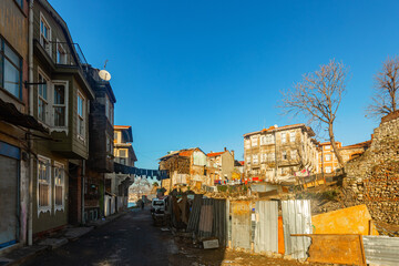 Fototapeta na wymiar Old dilapidated residential buildings in historic quarter Eminonu in Fatih district of Istanbul in Turkey. Photo made in 2021