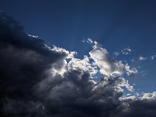 Dramatic blue sky with dark clouds in the summer in Brisbane, Queensland, Australia