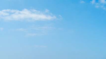 Summer scenery with a clear refreshing blue sky and beautiful white clouds in the upper left [Okinawa]