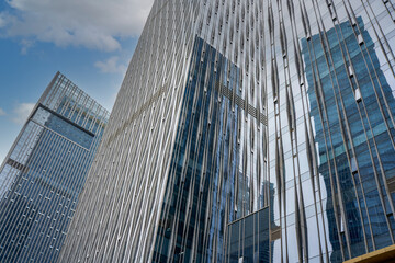 Obraz premium Modern architecture high-rise building, glass curtain wall office building