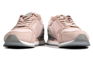Light pink summer sneakers on a white background, front view