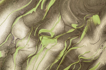 Abstract fluid art background dark brown and beige colors. Liquid marble. Acrylic painting with glitter golden gradient.